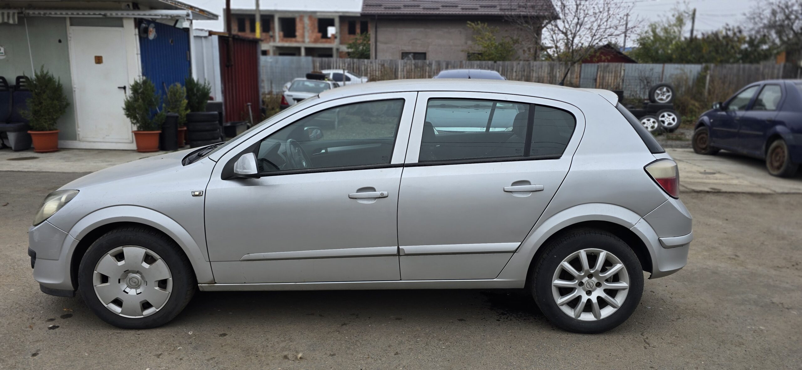 Maner exterior dreapta spate Opel Astra H cod culoare Z157 - imagine 3